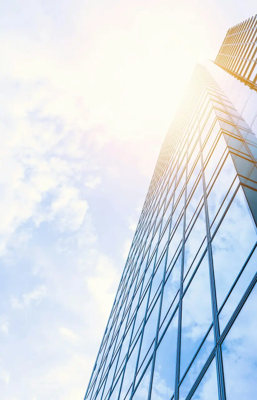 low-angle photo of curtain wall building